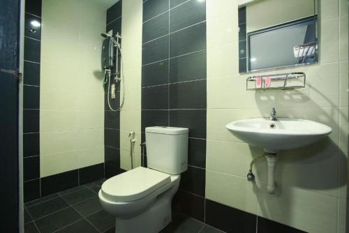 Koupelna v ubytování De Hotel