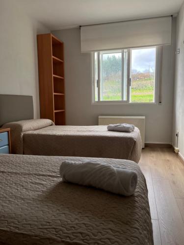 Postel nebo postele na pokoji v ubytování Casa Vimar