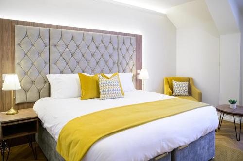 Ένα ή περισσότερα κρεβάτια σε δωμάτιο στο Walton View Hotel