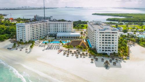 an aerial view of a hotel on the beach at Melia Casa Maya Cancun All Inclusive in Cancún