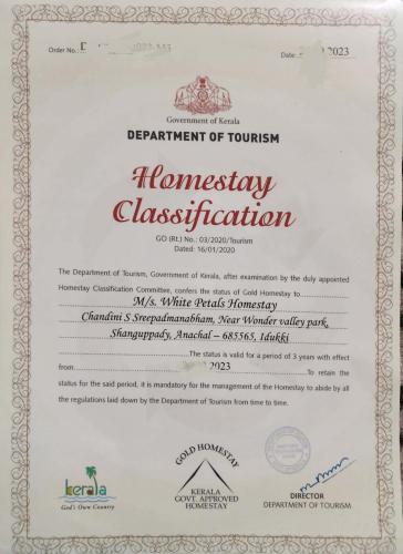a piece of paper with a certificate of involuntary dismissal at White Petals -3 BHK Homestay Munnar - Available For Indian Nationals Only in Munnar
