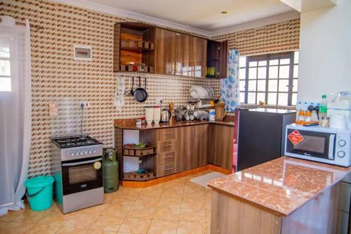 Η κουζίνα ή μικρή κουζίνα στο Jama Cosy Homes