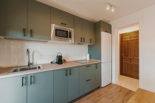 Η κουζίνα ή μικρή κουζίνα στο Apartamentos exclusivos en casco histórico