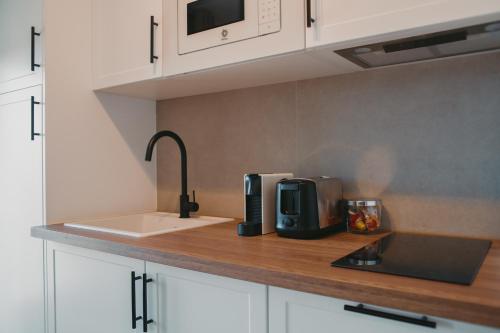 Η κουζίνα ή μικρή κουζίνα στο Apartamentos exclusivos en casco histórico