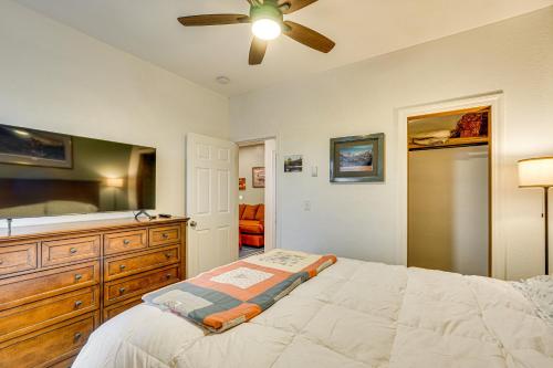 a bedroom with a bed and a ceiling fan at Walking Trail On-Site Tranquil Klamath Falls Apt! in Klamath Falls