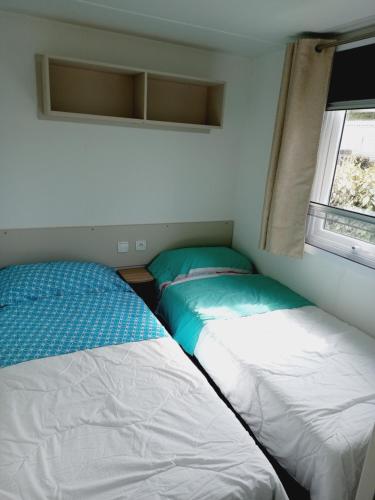 Postel nebo postele na pokoji v ubytování Mobil HOME 40 m2 3CH
