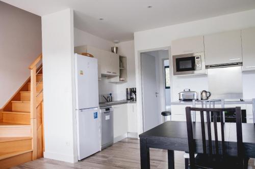 Photo de la galerie de l'établissement Villa avec vue sur le lac Domaine de Pitrot, à Lacanau