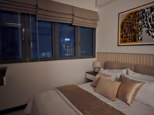 Katil atau katil-katil dalam bilik di 41st Floor TRIZEN Smart Luxury Apartment with sea view and portcity view