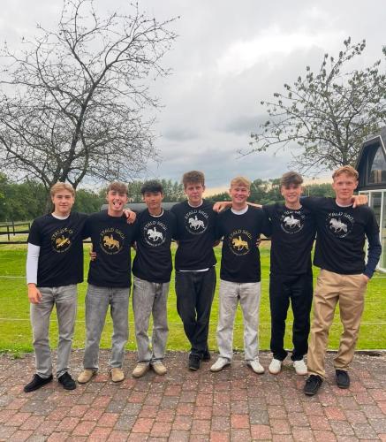 a group of young men wearing black tshirts at B&B Saga in Herning