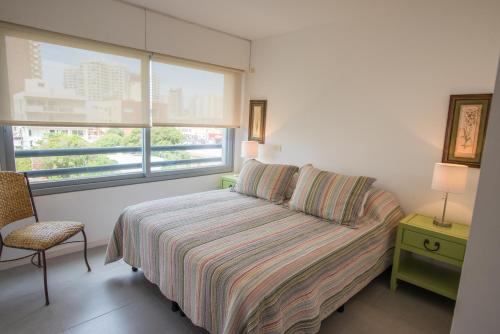Łóżko lub łóżka w pokoju w obiekcie Torre Francia