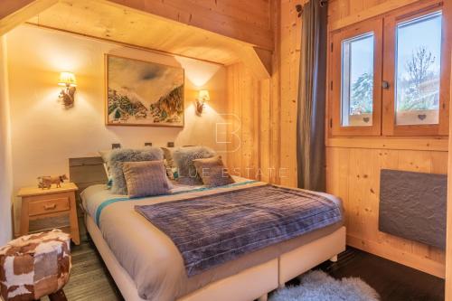 Postel nebo postele na pokoji v ubytování Chalet Le Hameau - Megève