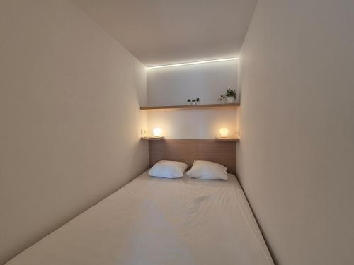 Giường trong phòng chung tại PLA 2 07 - Beautiful apt 4pers - Val Claret-Tignes- with garage