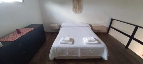 Ένα ή περισσότερα κρεβάτια σε δωμάτιο στο Shanti Loft