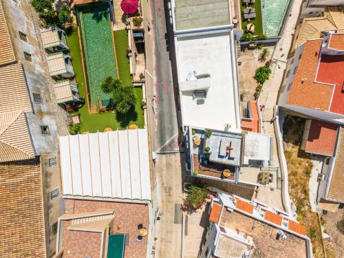 an overhead view of a city street with buildings at Vila Origens Boutique Hotel Albufeira – Adults Only in Albufeira