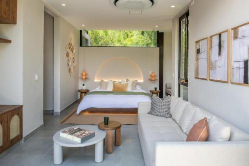 Ένα ή περισσότερα κρεβάτια σε δωμάτιο στο Casa Bosque Luxescape in Nature