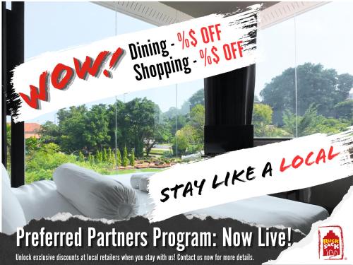 a poster for a furniture store with a sign that readssinging and shopping at Rucksack Inn Premium Melaka in Melaka