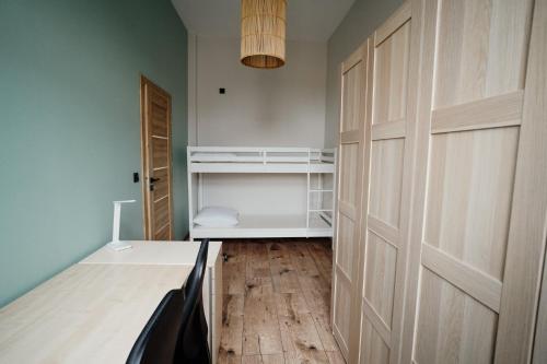 Postel nebo postele na pokoji v ubytování Apartament Novy Drezdenko