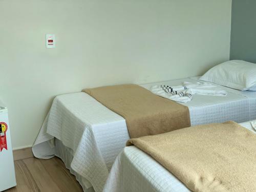 Cama o camas de una habitación en Hotel Grutta