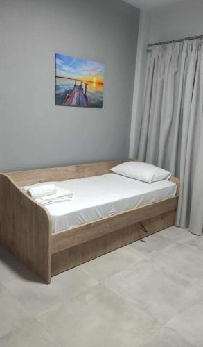 a bed sitting in a room with at BEST PARADISE IN NIKITI in Nikiti