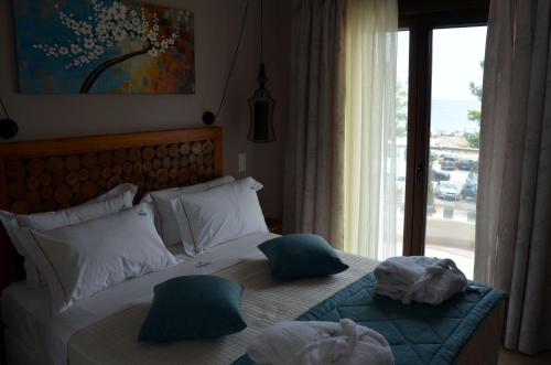 Gambar di galeri bagi Hatzoudis Luxury Suites di Chrysi Ammoudia