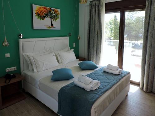 Gambar di galeri bagi Hatzoudis Luxury Suites di Chrysi Ammoudia