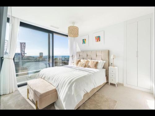 Ένα ή περισσότερα κρεβάτια σε δωμάτιο στο Villa Olivia