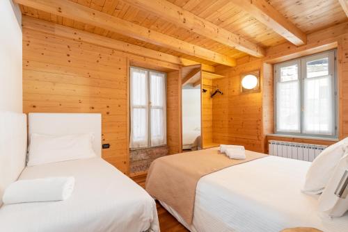 Postel nebo postele na pokoji v ubytování La Locandiera