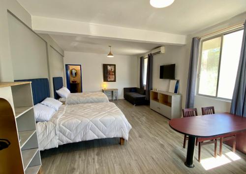Ένα ή περισσότερα κρεβάτια σε δωμάτιο στο Habitación loft en la Huasteca