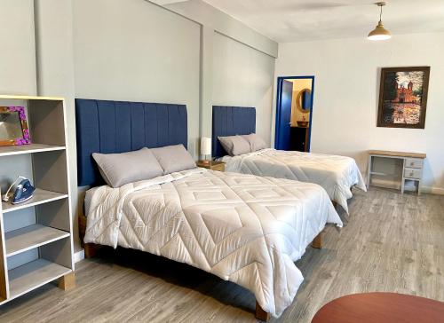 Ένα ή περισσότερα κρεβάτια σε δωμάτιο στο Habitación loft en la Huasteca