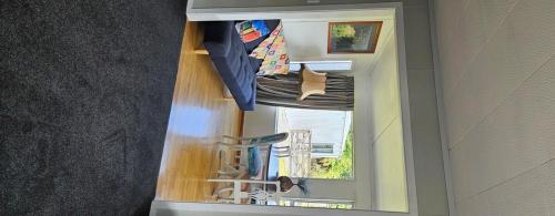an overhead view of an open window with an umbrella at Marg's on the Corner in Kumara