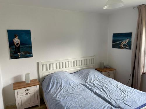 Postel nebo postele na pokoji v ubytování Ferienhaus Haus Nordlicht