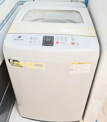 a fax machine sitting on a shelf in a store at River View Bangkok in Bangkok