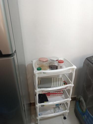 a refrigerator with a white shelf with food items in it at "comodidad, seguridad y cercano a todo" in Los Paredones