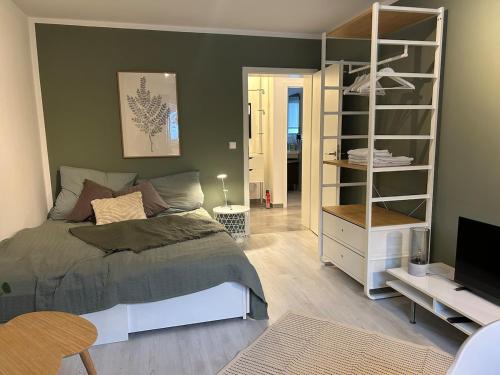 Postel nebo postele na pokoji v ubytování WALLENSTAY Apartment