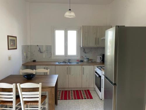 Kuchyň nebo kuchyňský kout v ubytování NAFSIKA Apartments