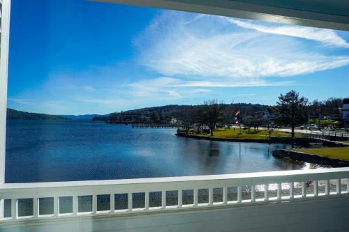 a view of a lake from a balcony at Mill Falls Resort Collection at the Lake in Meredith