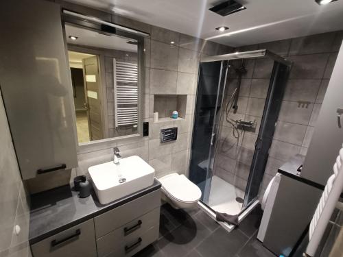 Ένα μπάνιο στο Apartamenty na Tylnej w Śremie