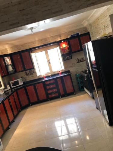 Kuchyň nebo kuchyňský kout v ubytování Duplex 5BD 3BR