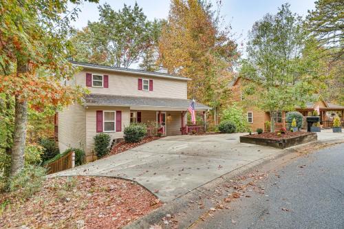 a house with a driveway in front of it at Spacious Home in Helen with Porch and Balcony! in Helen
