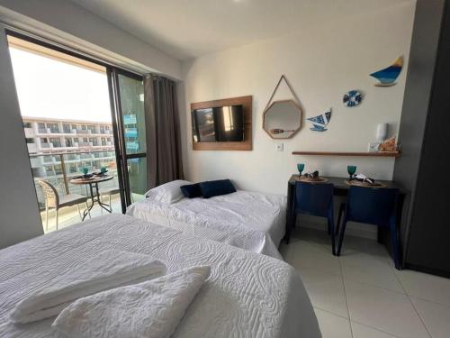 Postel nebo postele na pokoji v ubytování Mana Beach na Praia de Muro Alto Porto de Galinhas a 300 metros da Praia