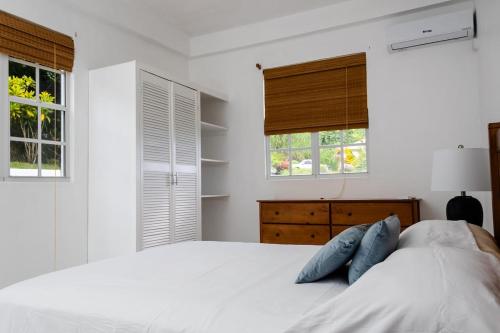 Ein Bett oder Betten in einem Zimmer der Unterkunft Sea and Summit Villa