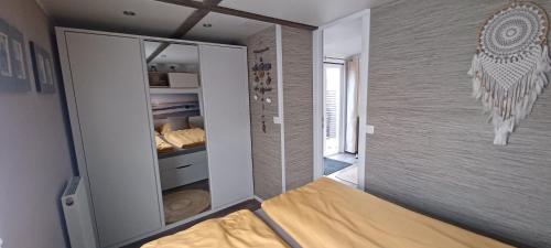 Postel nebo postele na pokoji v ubytování Chalet Zeewind
