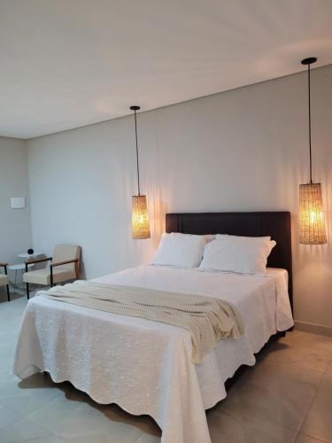 Ένα ή περισσότερα κρεβάτια σε δωμάτιο στο Cipó Lofts - Serra do Cipó
