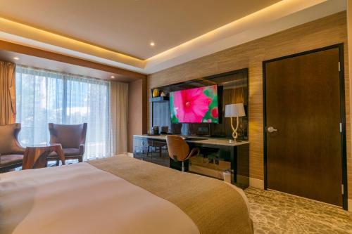 TV a/nebo společenská místnost v ubytování K Tower Boutique Hotel By Lucerna