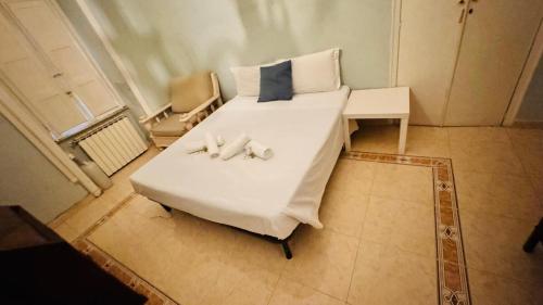 a bedroom with a bed with two candles on it at apt via cernaia rome center in Rome