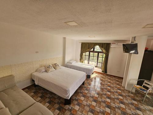Ένα ή περισσότερα κρεβάτια σε δωμάτιο στο Casa Rentera D Elías 5