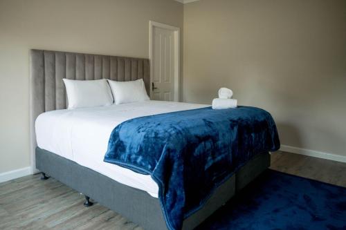 Ένα ή περισσότερα κρεβάτια σε δωμάτιο στο Bellevue Holiday House