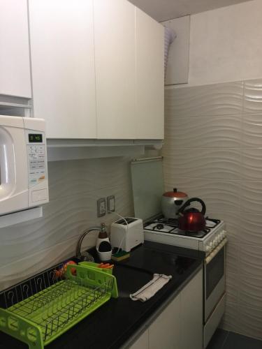Η κουζίνα ή μικρή κουζίνα στο Nice apartment 100 meters away from Playa Brava