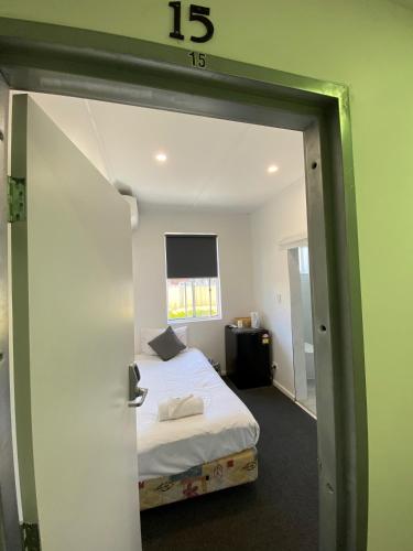 Katil atau katil-katil dalam bilik di Central Motel Mudgee