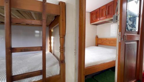 a bunk bed room with two bunk beds in it at El Ismael de Jaguas in San Rafael